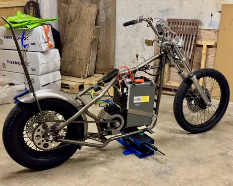 The whole bike standing in the garage