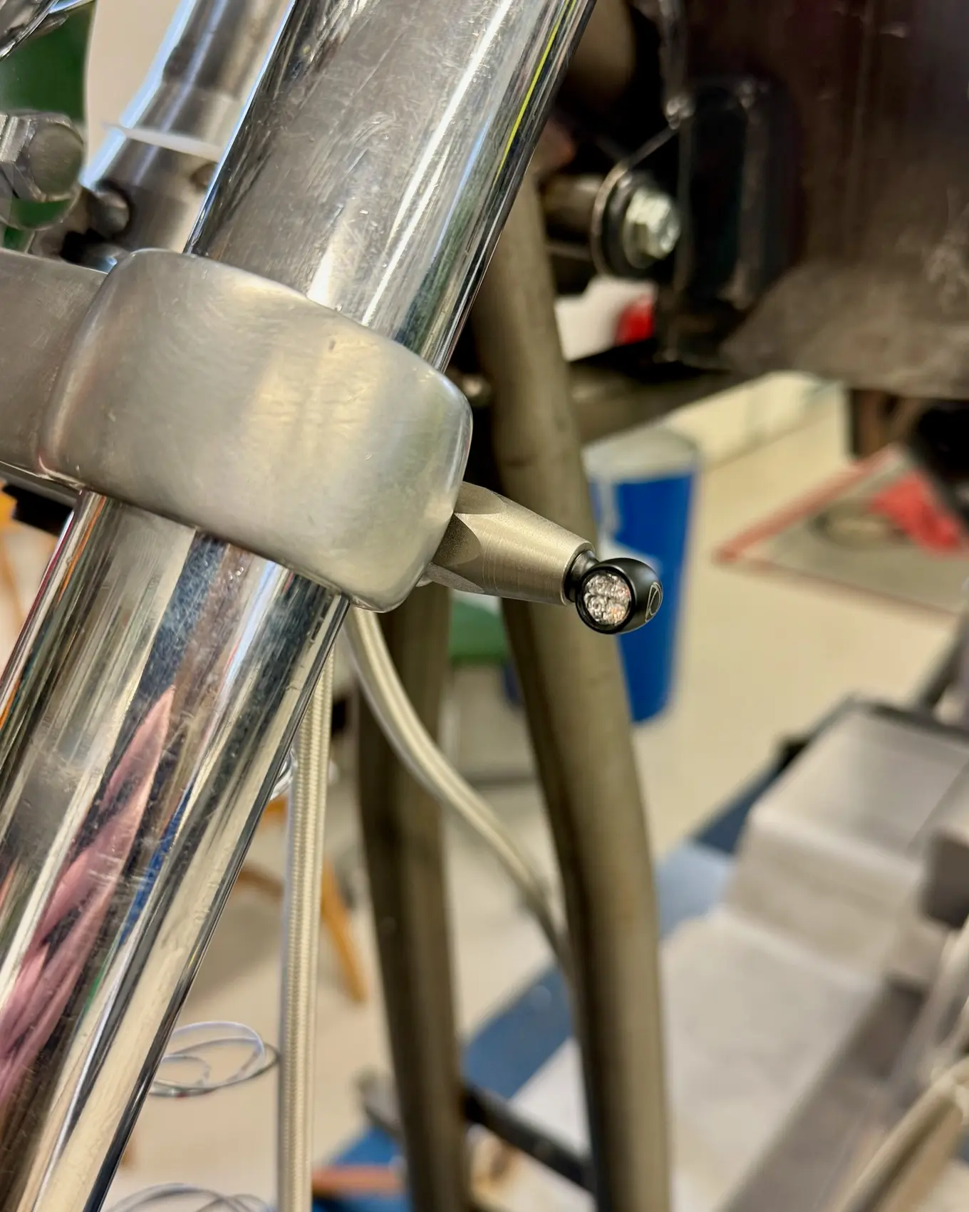 The top clamp and fork tubes at the steering head