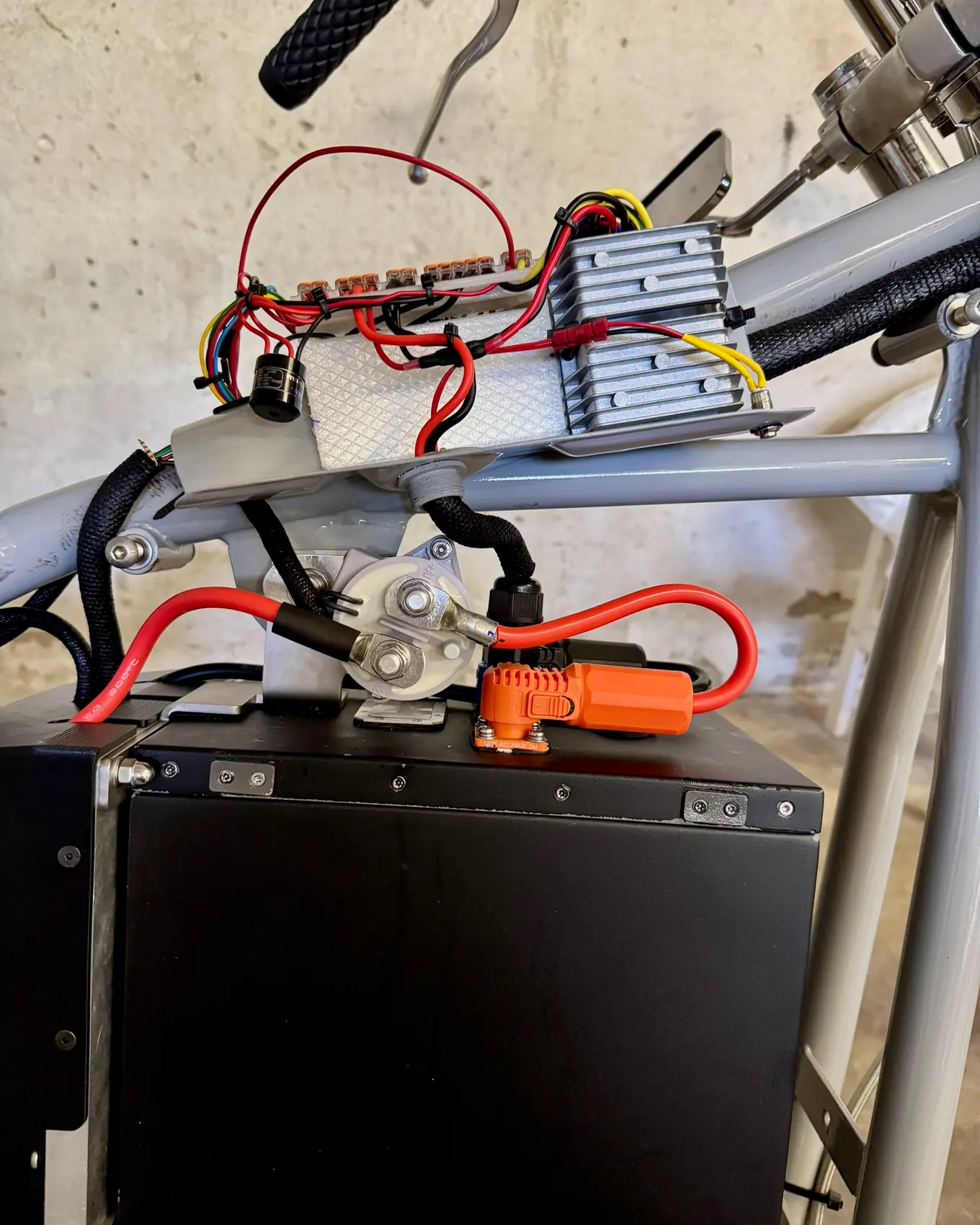 The battery box with the main cables run and terminated